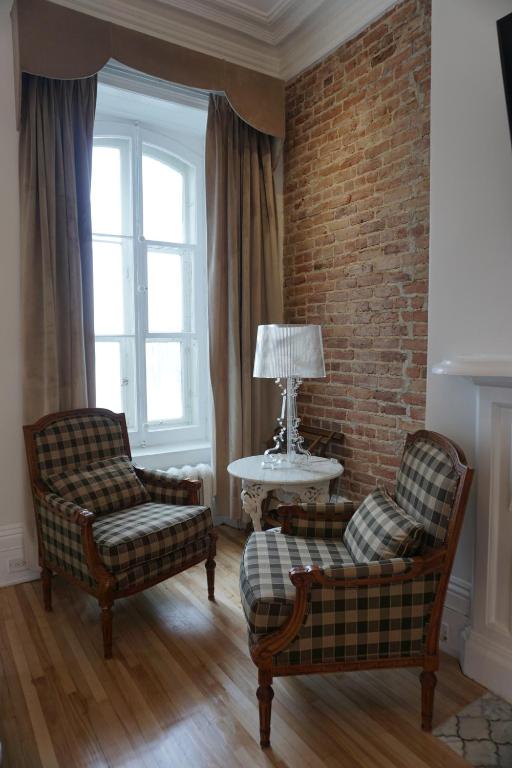 Posezení v ubytování Hôtel Marie-Rollet
