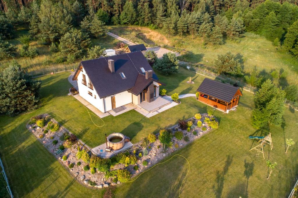 an aerial view of a house with a yard at Siedlisko Rogówko in Rogówko