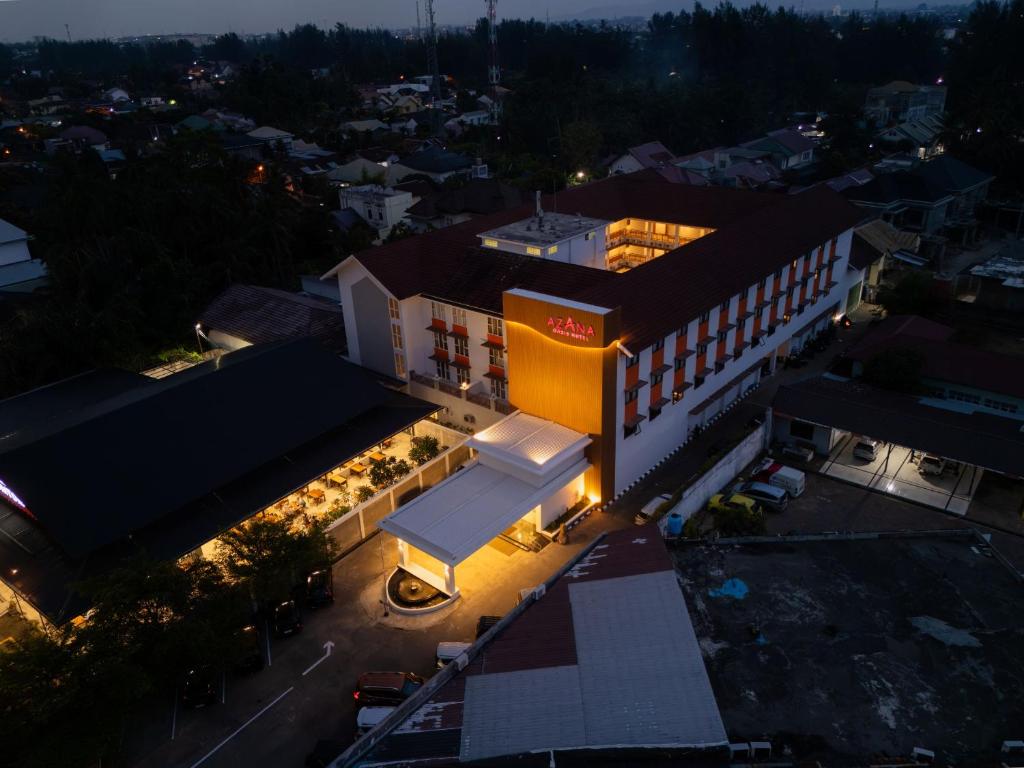 an overhead view of a building in a city at night at Azana Oasis Hotel Aceh in Luengbata