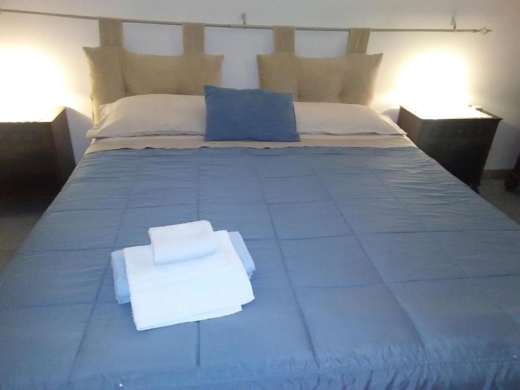 Postel nebo postele na pokoji v ubytování B&B Il Tulipano