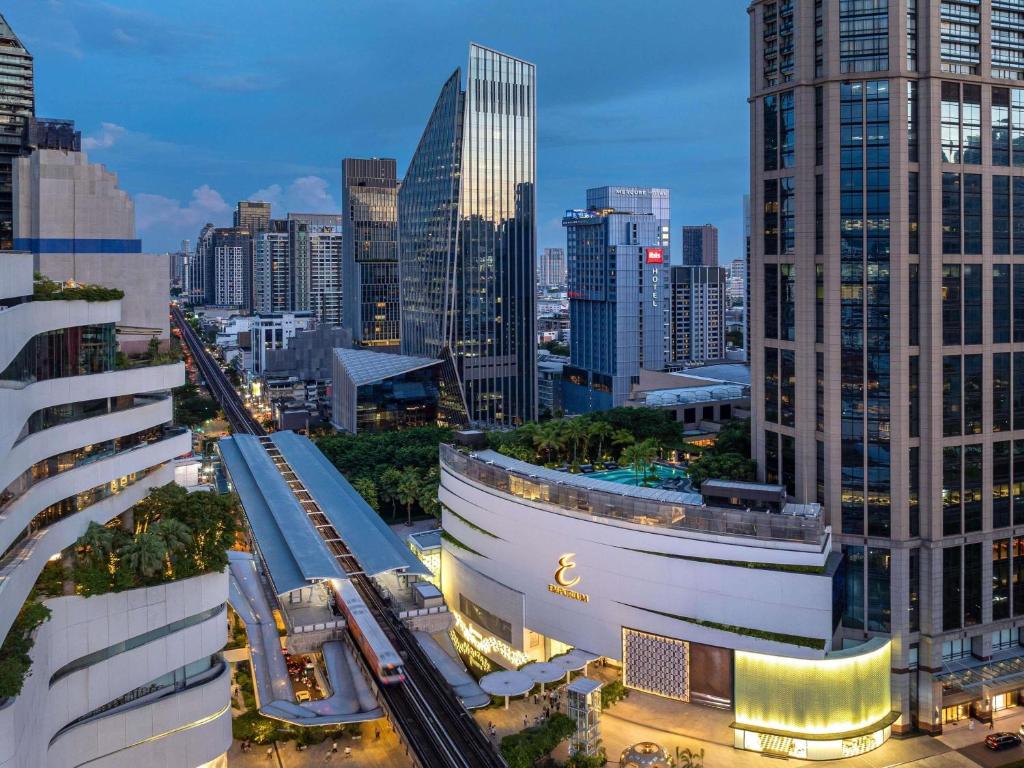 a view of a city skyline with tall buildings at Mercure Bangkok Sukhumvit 24 in Bangkok