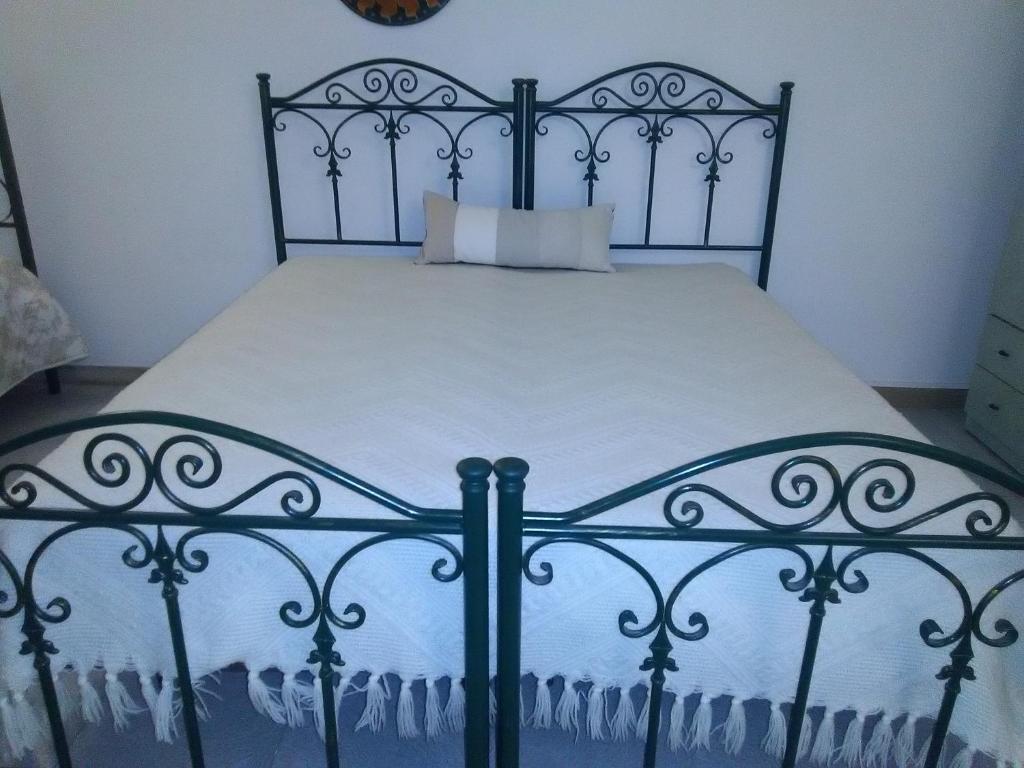 Postel nebo postele na pokoji v ubytování B&B Il Tulipano