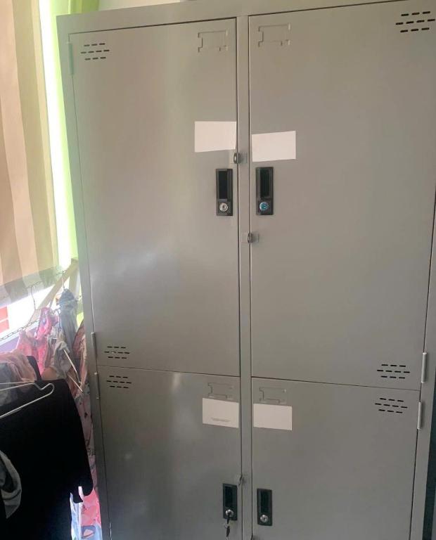 a pair of metal lockers in a room at eStay in Ho Chi Minh City
