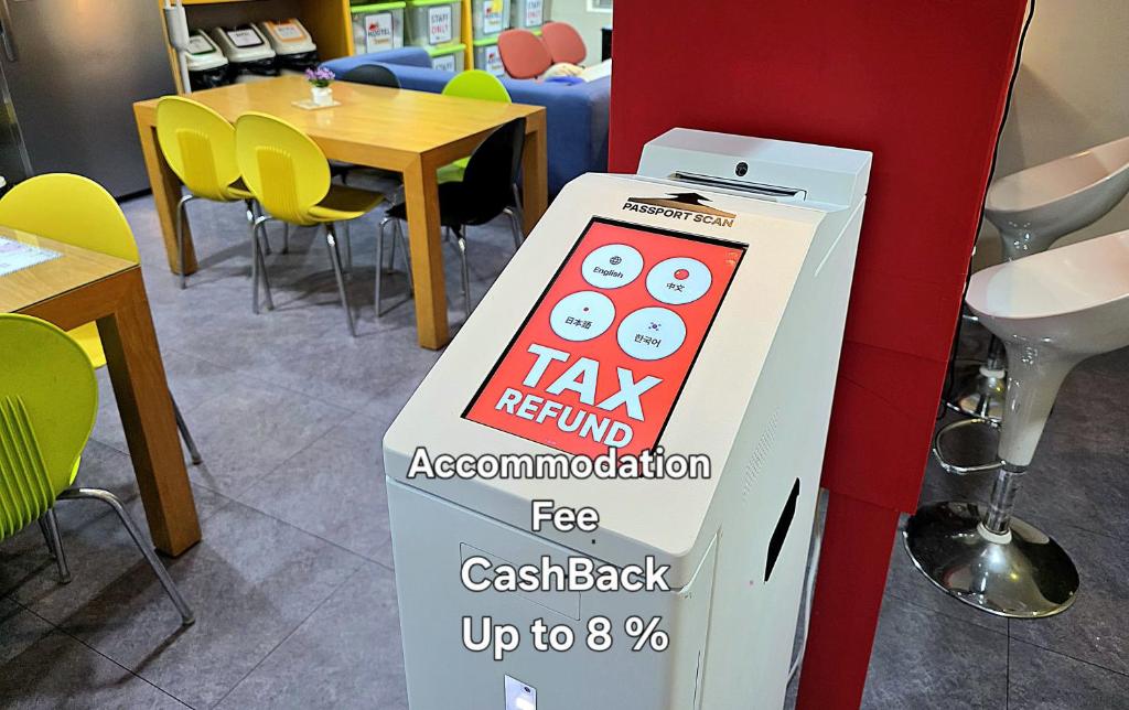 a sign for a tax refund event in a restaurant at Hostel Tommy Jongno ---- Tax Return Authorized Shop in Seoul