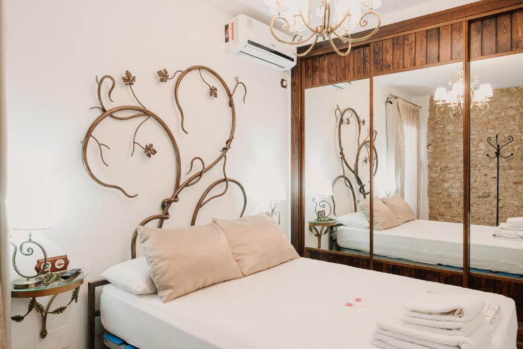 Un pat sau paturi într-o cameră la Columbaira