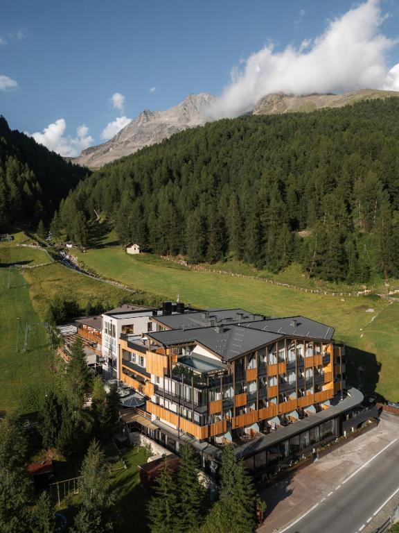 an aerial view of a hotel in the mountains at MyPARADIES in Solda
