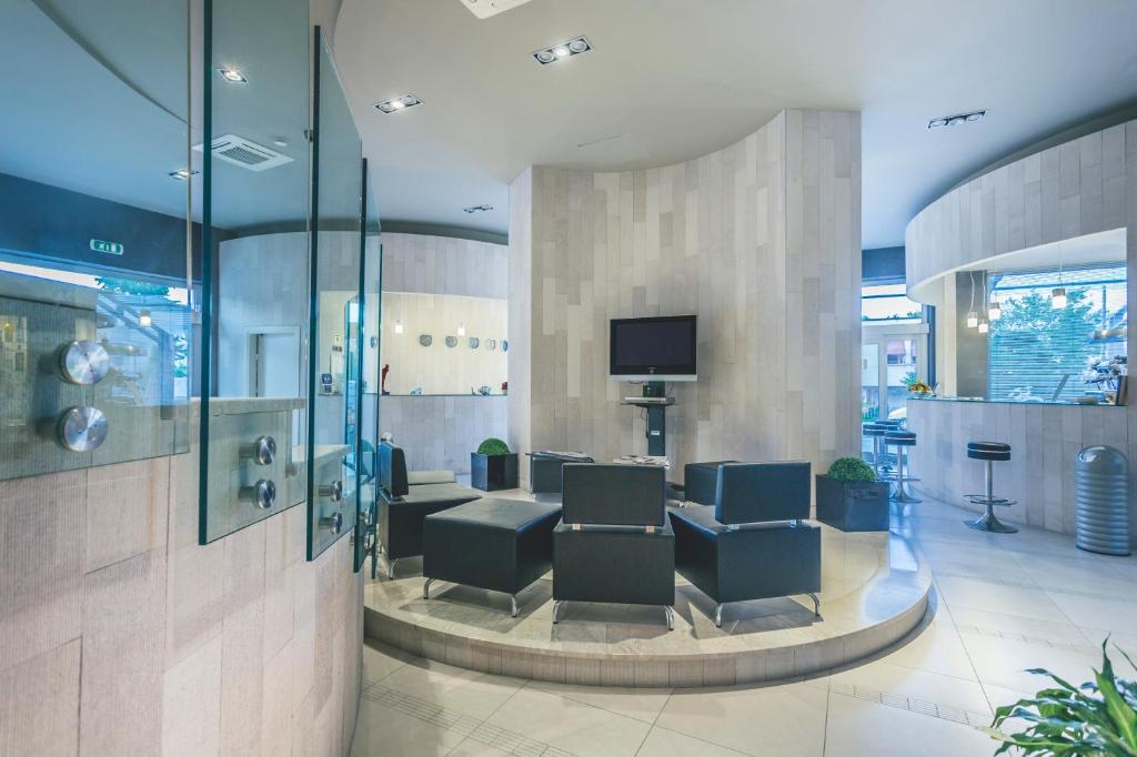 TV a/nebo společenská místnost v ubytování Hotel Principe Residence