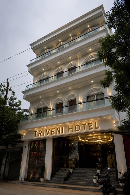 a hotel with a sign that reads french hotel at Triveni Hotel And Restaurant in Barsāna