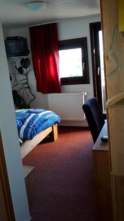 Postel nebo postele na pokoji v ubytování Hotel-Pension- Vesperstube Waldblick