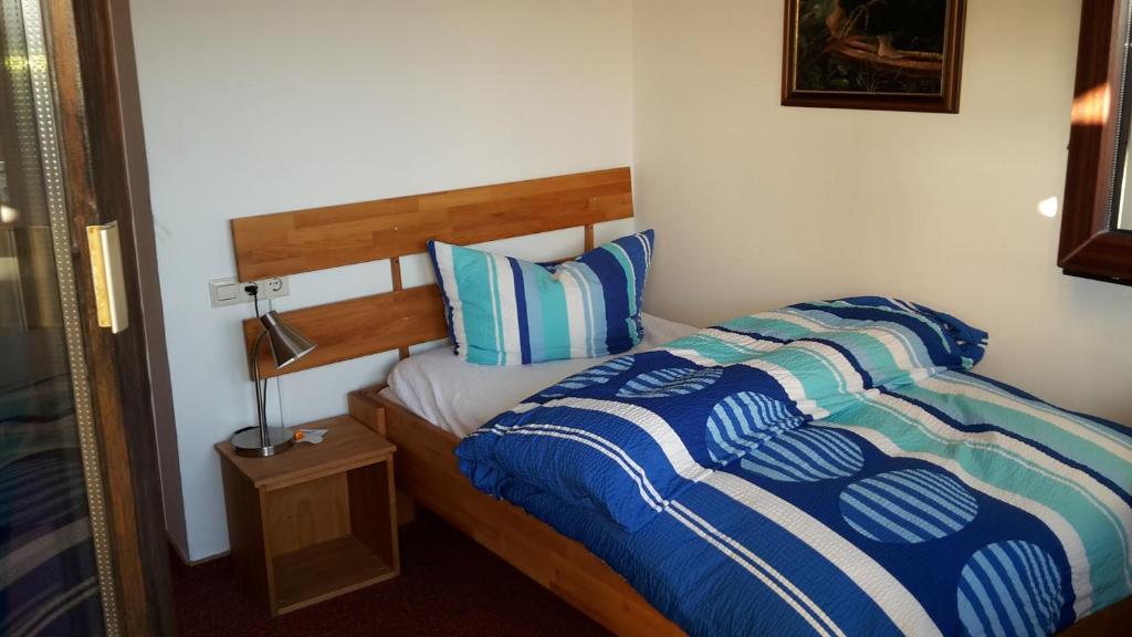 Postel nebo postele na pokoji v ubytování Hotel-Pension- Vesperstube Waldblick