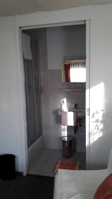 Postel nebo postele na pokoji v ubytování Hotel-Pension- Vesperstube Waldblick