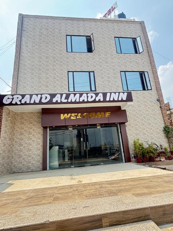 a building with a sign that reads grand almada inn at Grand Almada Inn in Lucknow