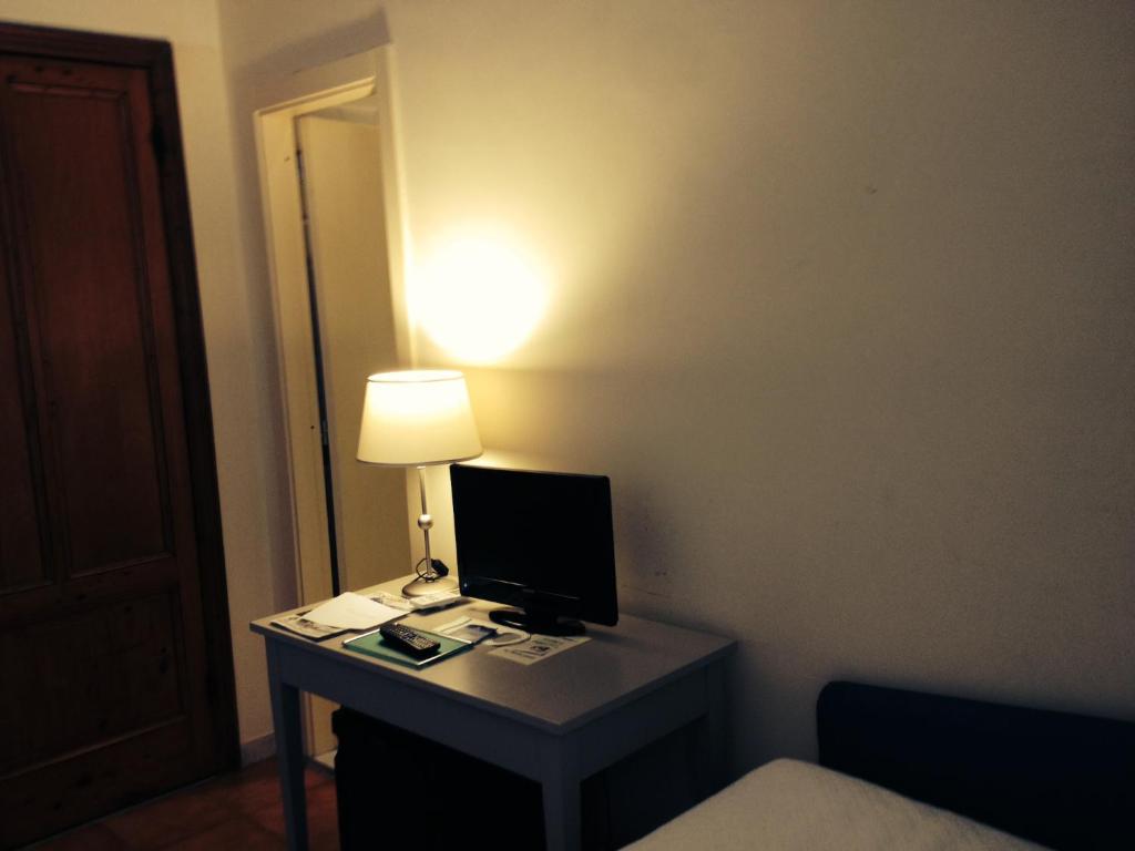 TV a/nebo společenská místnost v ubytování Hotel Miramare