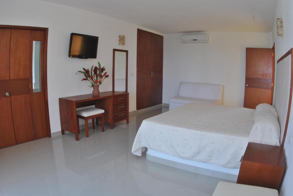 Postel nebo postele na pokoji v ubytování Hotel Istirinchá