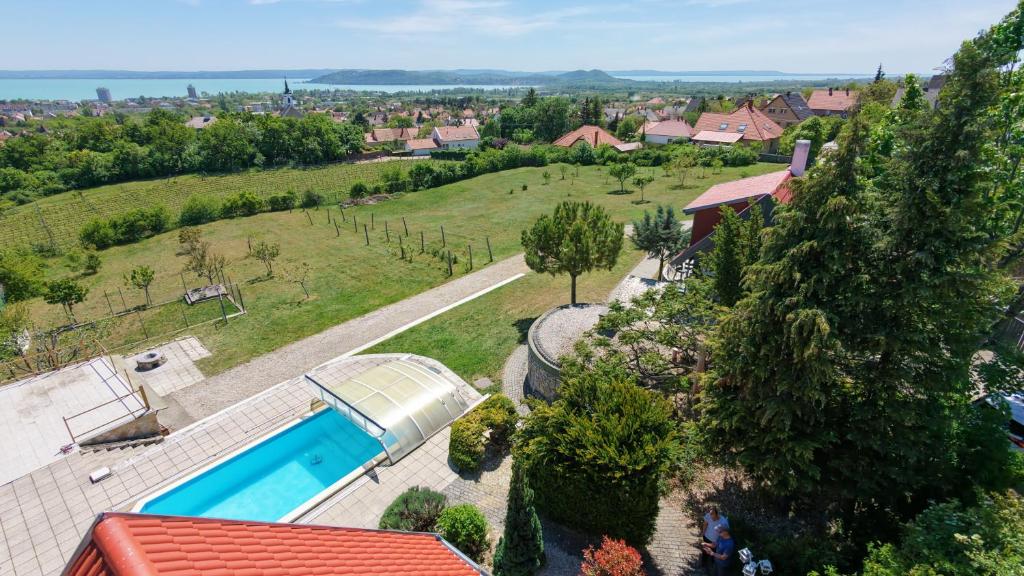 an aerial view of a house with a swimming pool at Lake Horizon in Balatonfüred
