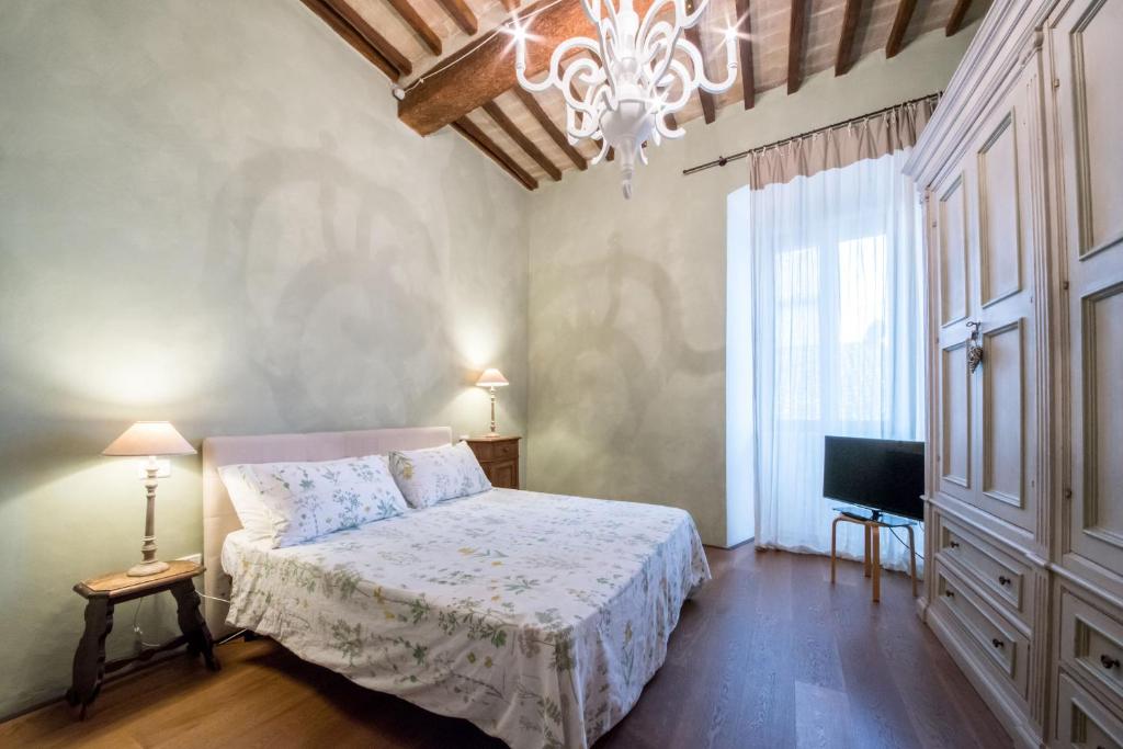 Cama ou camas em um quarto em B&B La Zuppa Inglese
