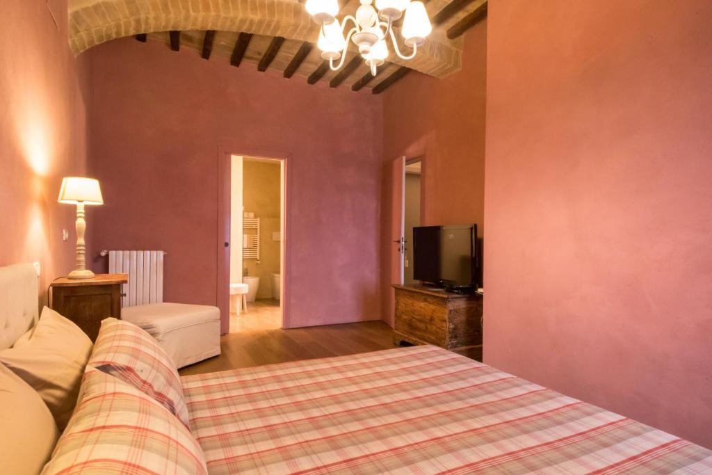 Cama ou camas em um quarto em B&B La Zuppa Inglese