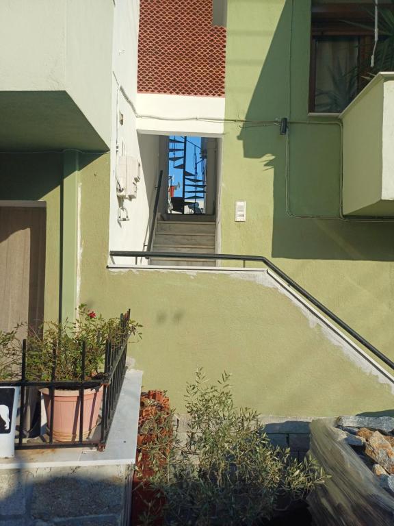 a house with a swimming pool in a yard at LA.KI House in Kavála