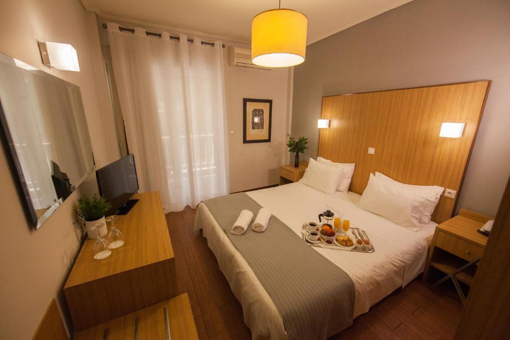 TV a/nebo společenská místnost v ubytování Myrto Hotel