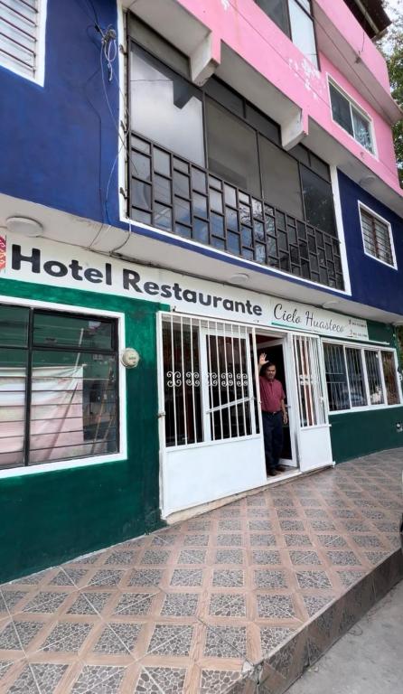 a person standing in the door of a hotel restaurant at Hotel Cielo Huasteco in Ciudad Valles