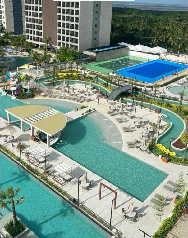 an aerial view of a pool at a resort at GAV Beach Resort - Smart in Salinópolis