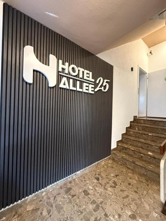 a hotel alliance sign on the wall of a building at Hotel Allee 25 in Stuttgart