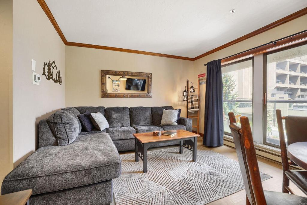 a living room with a couch and a table at Beaver Run Studio With Kitchen, Dog Friendly- 4217 in Breckenridge