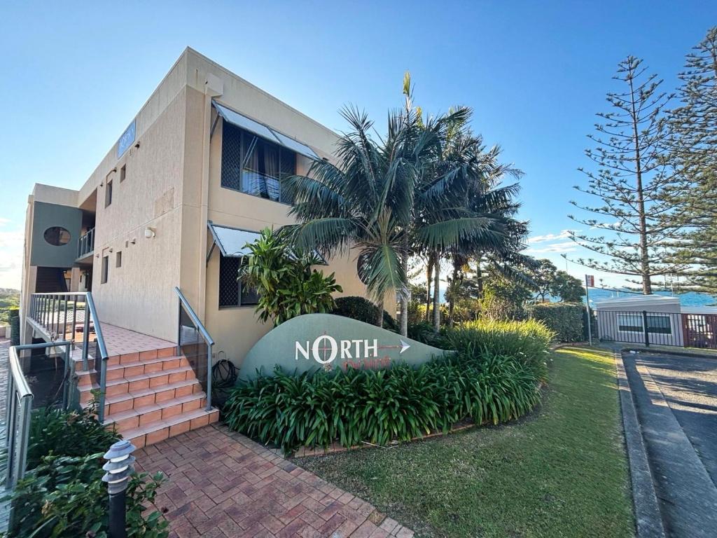 a building with a sign that says no edit on it at Northpoint Apartment 5 - Bring your own linen. in South West Rocks