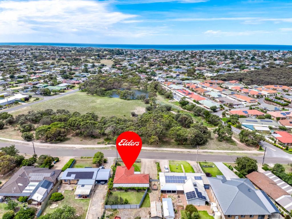 an aerial view of a suburb with a red stop sign at Cockles on Willmett road in Goolwa