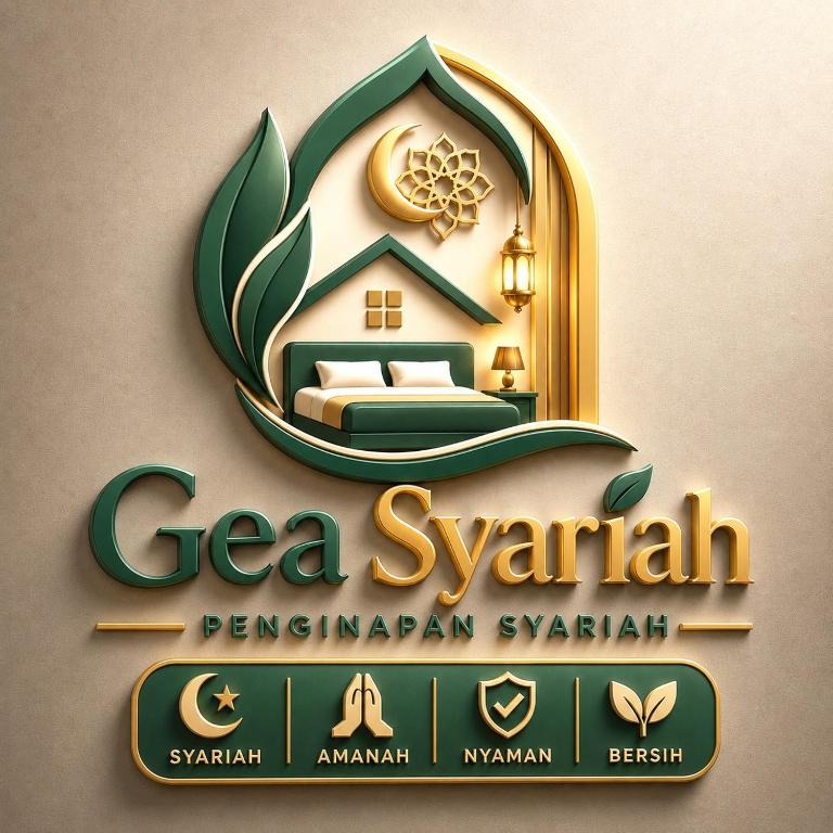 a sign for a hotel with a bed in a room at GEA Syariah in Bengkeng