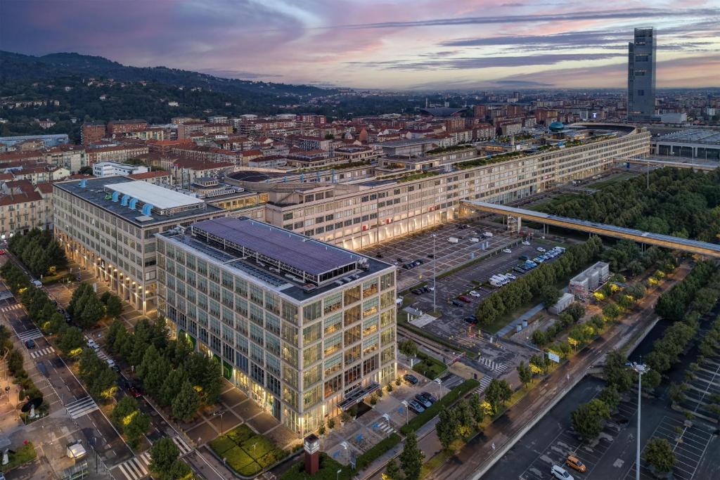 an overhead view of a large building in a city at DoubleTree by Hilton Turin Lingotto in Turin