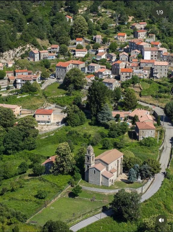 an aerial view of a small town on a hill at Chalet in Tasso