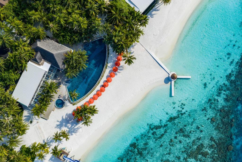 an aerial view of a beach with a clock on it at OBLU SELECT Sangeli - Premium All Inclusive with Free Transfers in Olhuhali