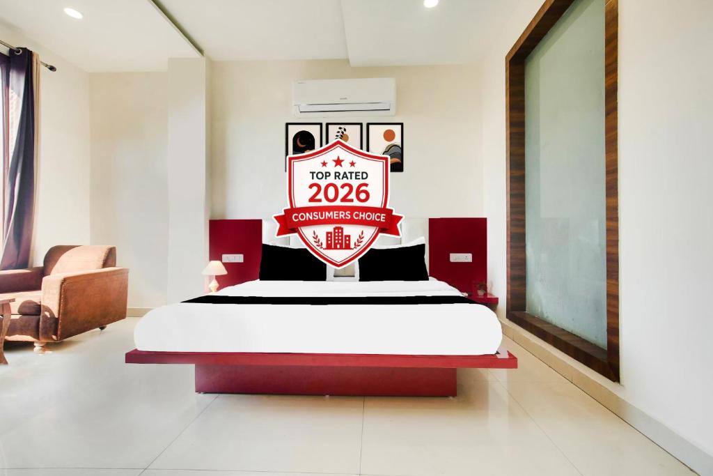 a bedroom with a bed with a sign that reads top were at Super Collection O by OYO Railway Station Amritsar Formerly Golden Home in Amritsar