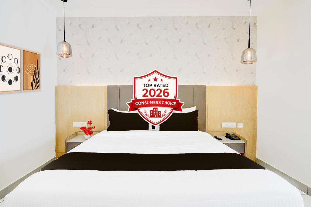 a bed with a sign that says you are at Townhouse Oak AECS Layout Brookfield in Bangalore