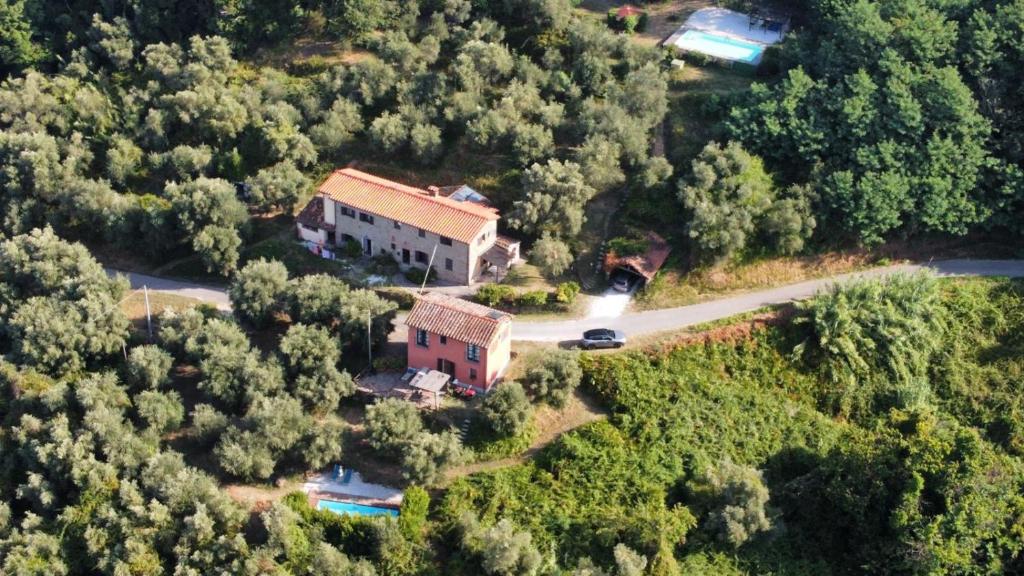 an aerial view of a house in a forest at Casa Cielo in Pescia
