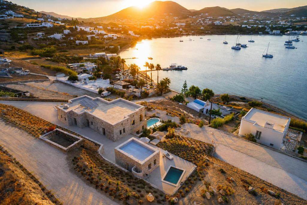 an aerial view of a house next to a body of water at Eunoia Suites in Krotiri