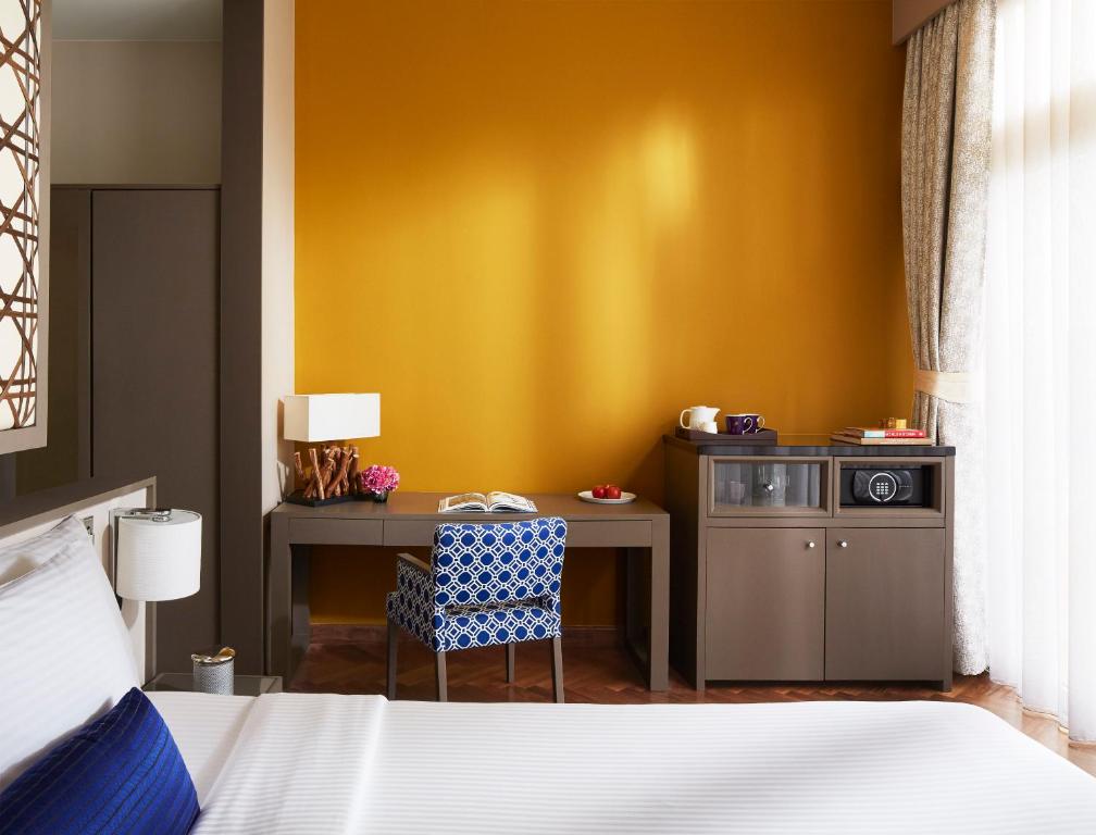 Postel nebo postele na pokoji v ubytování Sentido Heritance Negombo