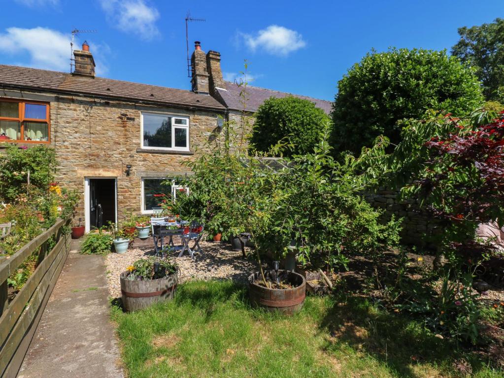 a house with a garden in front of it at Banklands in Barnard Castle