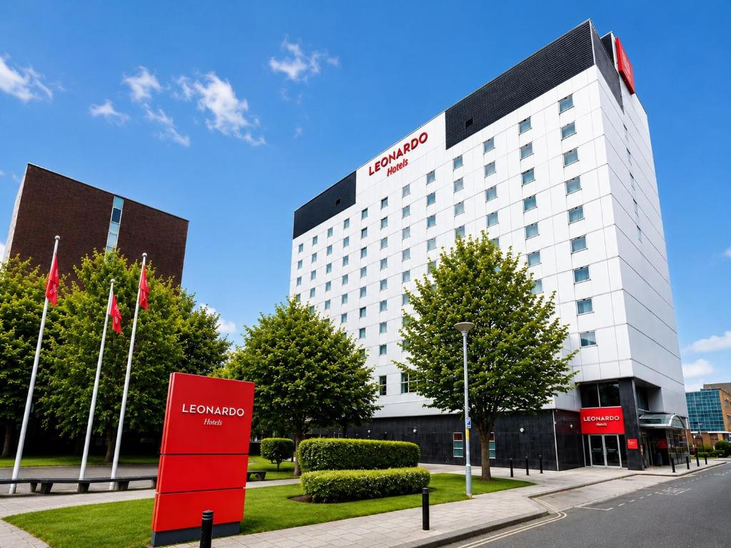 a hotel building with a red sign in front of it at Leonardo Hotel Middlesbrough in Middlesbrough