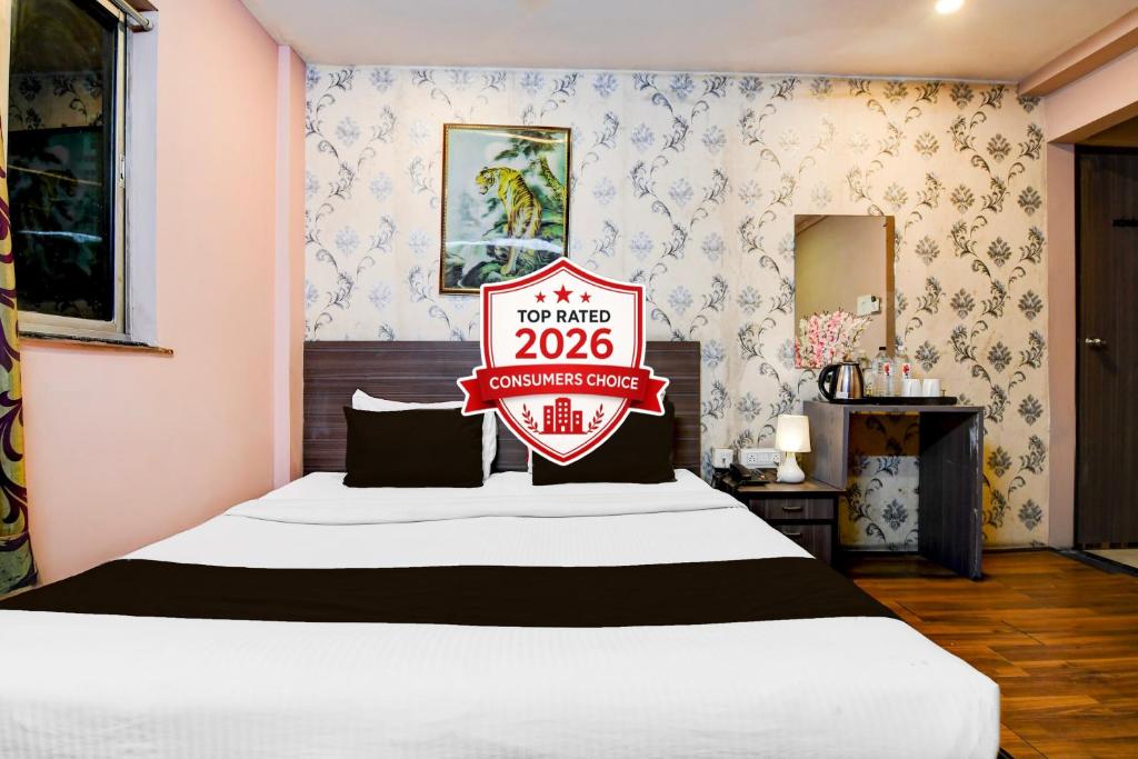 a hotel room with a sign that reads do not enter at Super Collection O Circus Avenue Road Formerly Hotel Rockstar in Kolkata