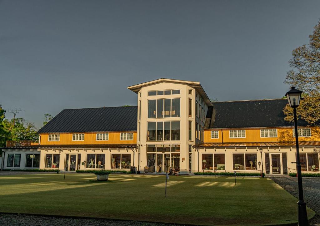 a large building with a lot of windows at Elisefarm in Fogdarp