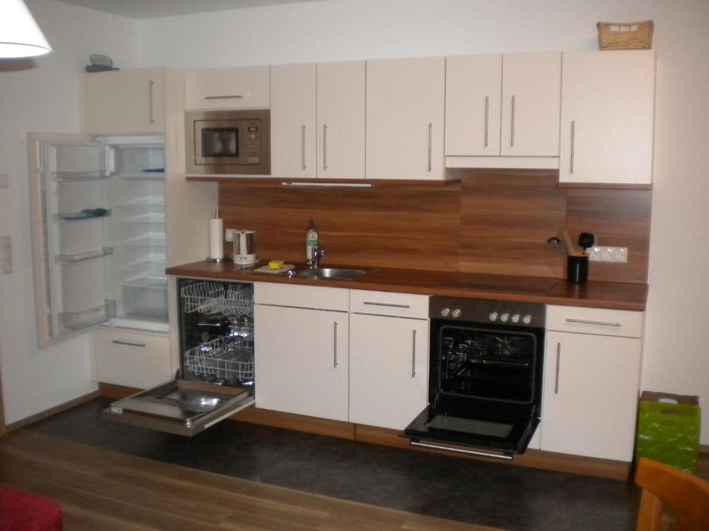 A kitchen or kitchenette at Appartement Andi