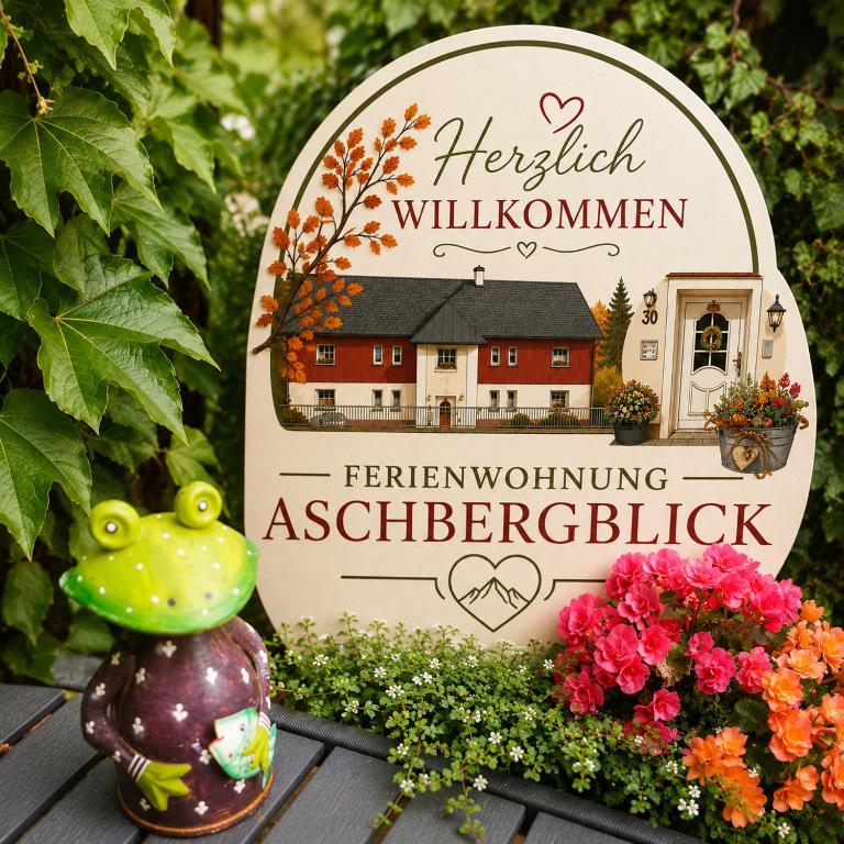 a sign for a garden with a house at FEWO Aschbergblick in Klingenthal
