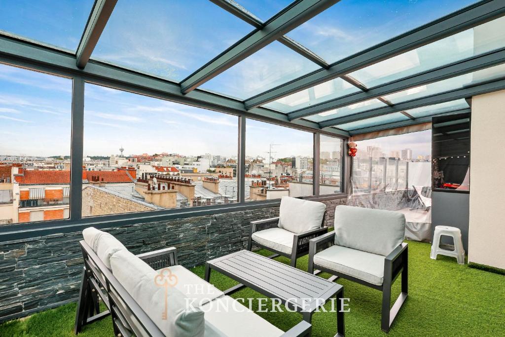 Penthouse de 210m2 comprenant 3 chambres à Paris avec Terrasse et Véranda avec climatisation