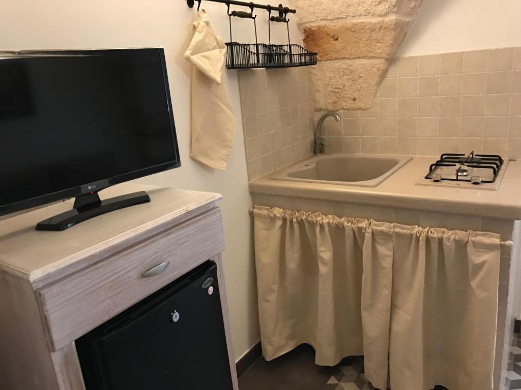 A kitchen or kitchenette at Casa Doria