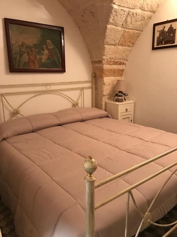A bed or beds in a room at Casa Doria