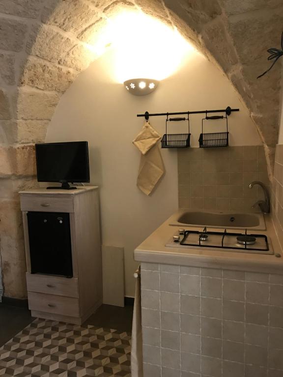 A kitchen or kitchenette at Casa Doria