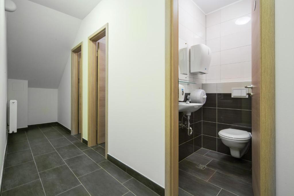 Koupelna v ubytování KAPTOL Rooms