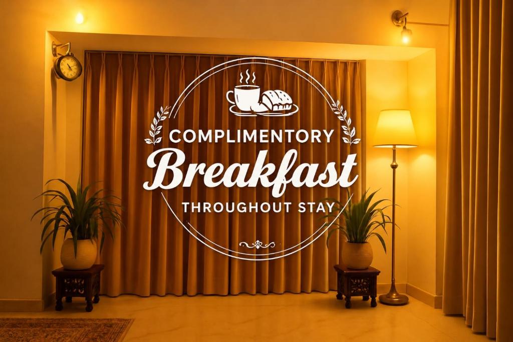 a sign that reads complimentary breakfast throughout stay in a room at Vista villa Where luxury meets comfort MTDC Affiliated in Deolāli